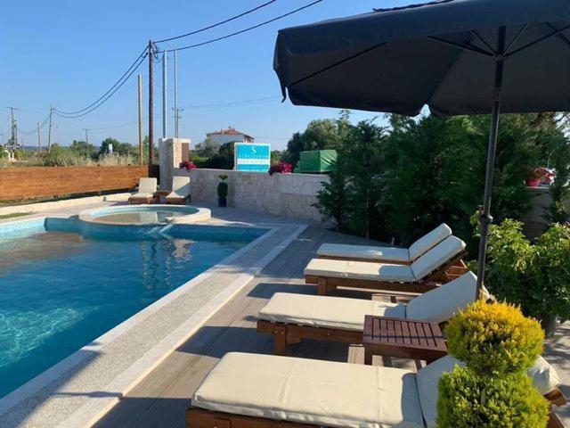 Sinodinos Deluxe Apartments Afytos Buitenkant foto