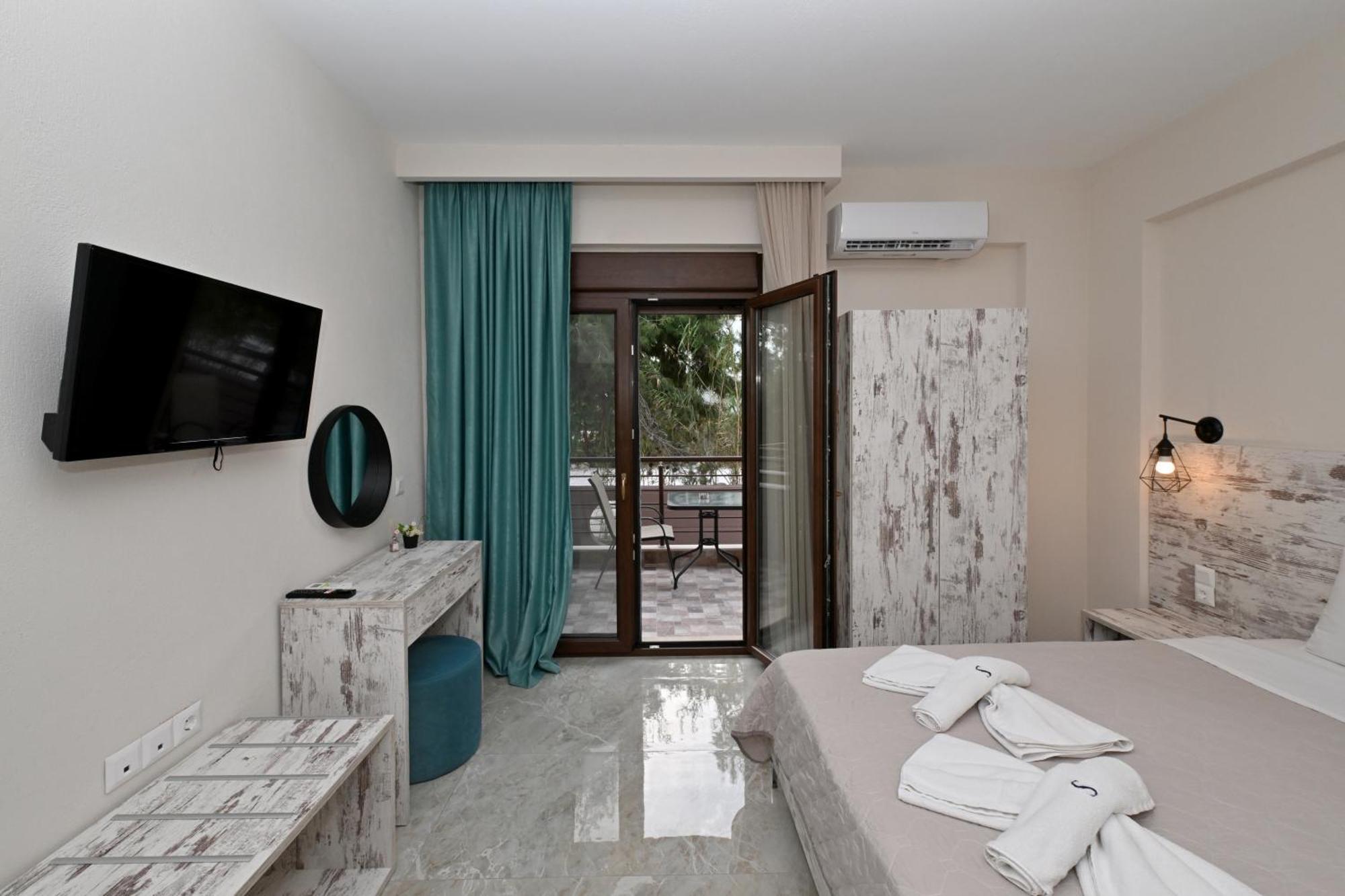 Sinodinos Deluxe Apartments Afytos Buitenkant foto